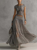 Monique | Completo top grigio con inserti in pizzo e gonna lunga plissettata