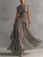 Monique | Completo top grigio con inserti in pizzo e gonna lunga plissettata