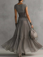 Monique | Completo top grigio con inserti in pizzo e gonna lunga plissettata