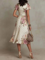 Alba | Abito midi a portafoglio arricciato con elegante stampa floreale