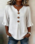 Sophie | Blusa bottonata con volant