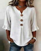 Sophie | Blusa bottonata con volant
