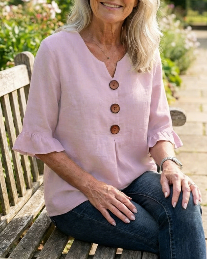 Sophie | Blusa bottonata con volant