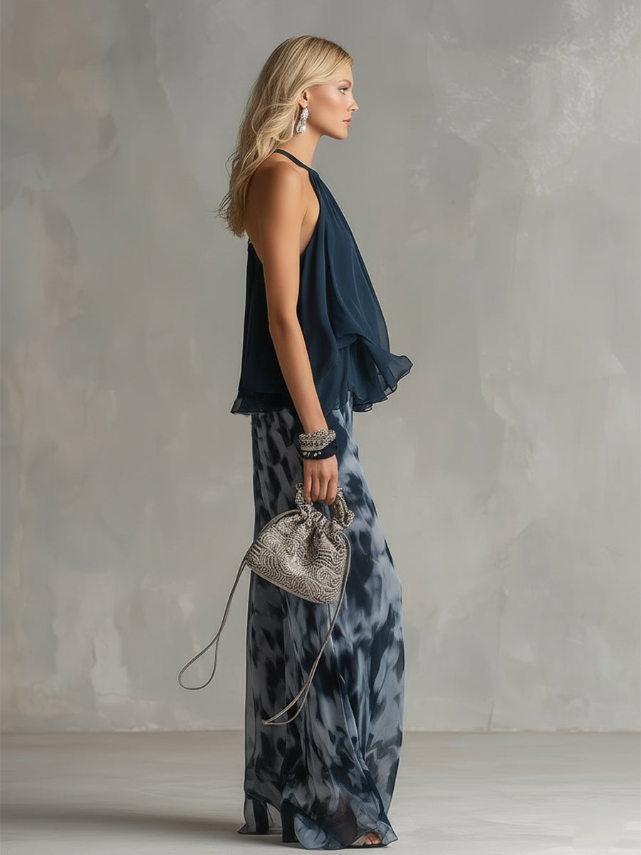 Chloé | Completo elegante con top blu navy e pantaloni larghi stampati