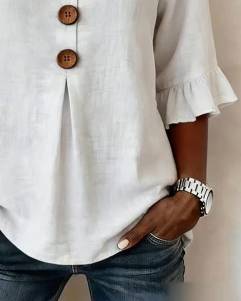 Sophie | Blusa bottonata con volant