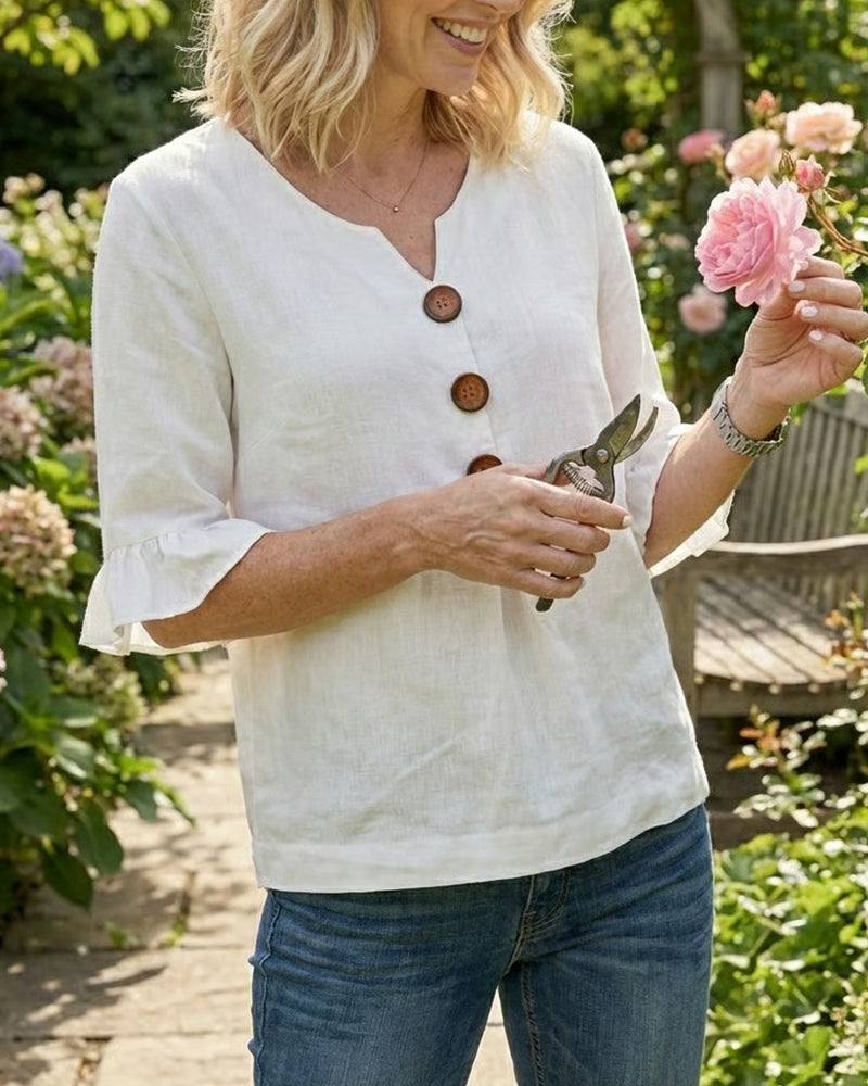 Sophie | Blusa bottonata con volant