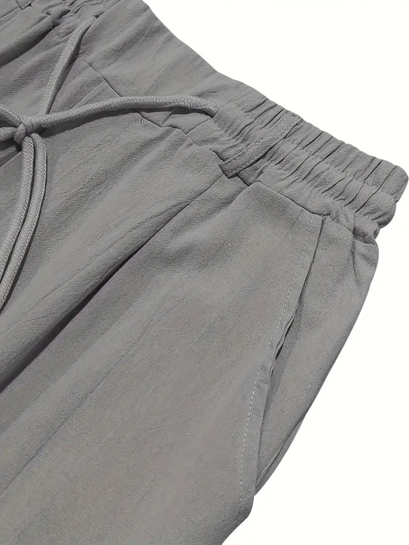 NICHOLS | PANTALONI LARGHI IN LINO CON CORDINO