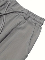 NICHOLS | PANTALONI LARGHI IN LINO CON CORDINO