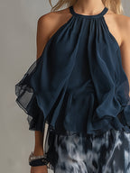 Chloé | Completo elegante con top blu navy e pantaloni larghi stampati
