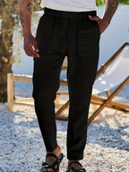 NICHOLS | PANTALONI LARGHI IN LINO CON CORDINO