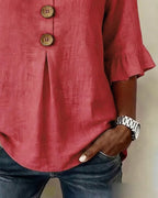 Sophie | Blusa bottonata con volant
