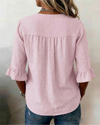 Sophie | Blusa bottonata con volant
