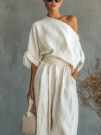 Emma | Completo elegante a due pezzi asimmetrico