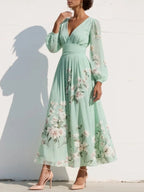 Susane | Abito maxi plissettato in chiffon verde menta con stampa floreale per donna