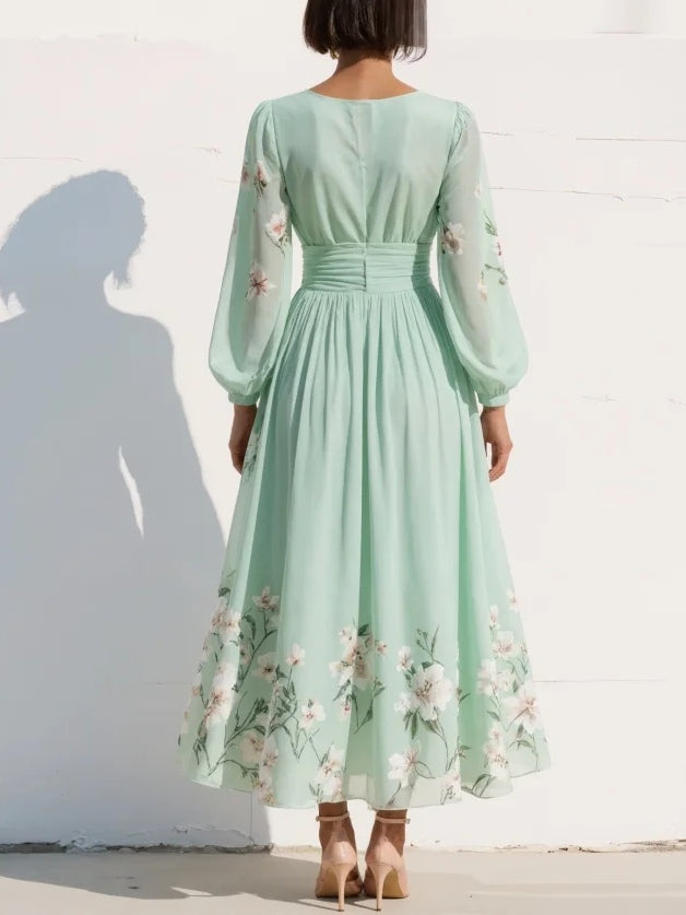 Susane | Abito maxi plissettato in chiffon verde menta con stampa floreale per donna