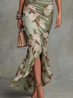 Anne™ | Abito lungo asimmetrico in satin verde con scollatura a V, maniche a sbuffo e stampa floreale