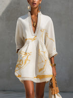 Aliénor | Abito Mini in Pizzo Crochet Avorio con Motivi Dorati e Scollo a V