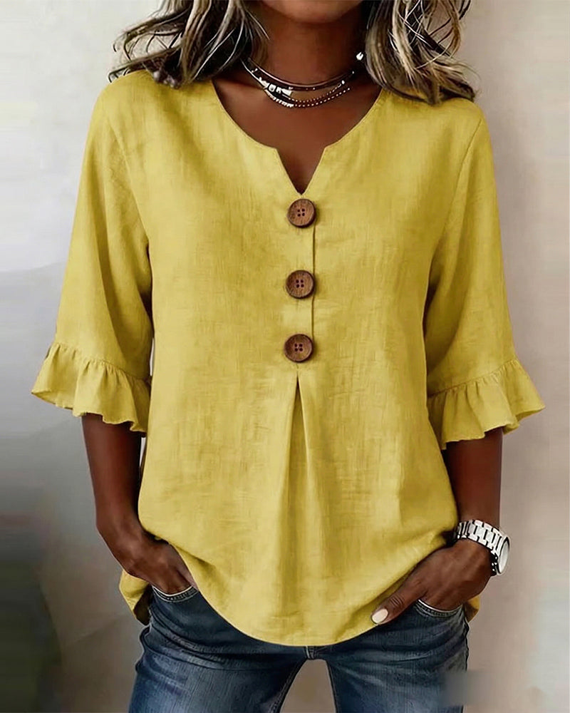 Sophie | Blusa bottonata con volant