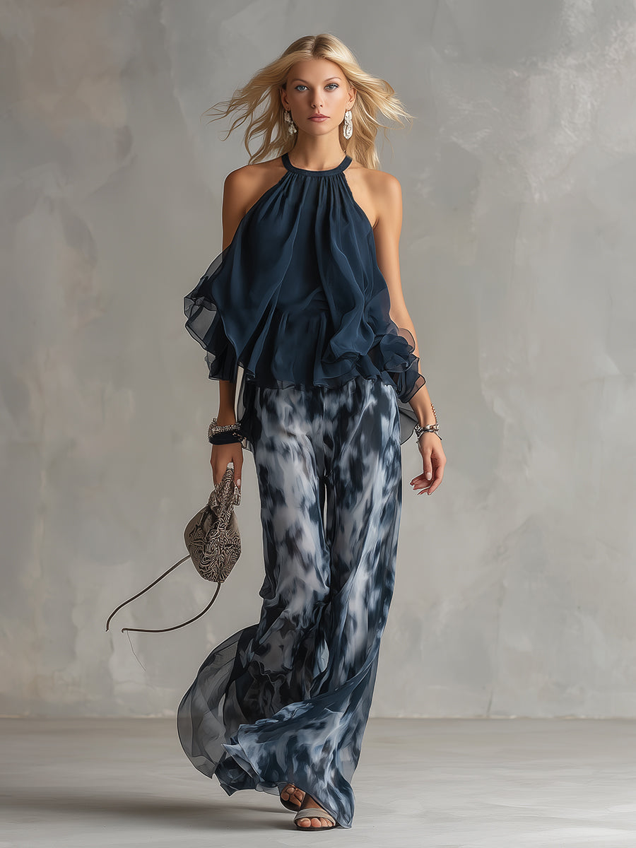 Chloé | Completo elegante con top blu navy e pantaloni larghi stampati