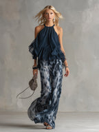 Chloé | Completo elegante con top blu navy e pantaloni larghi stampati
