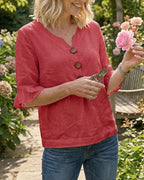 Sophie | Blusa bottonata con volant