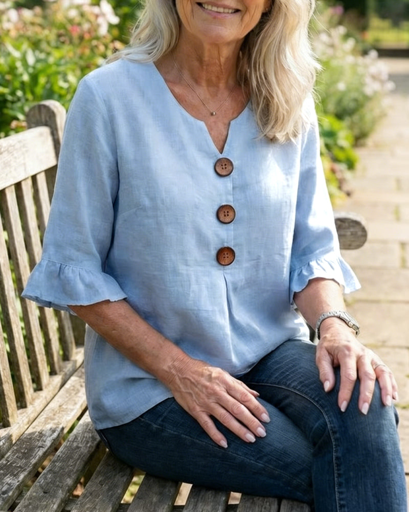 Sophie | Blusa bottonata con volant