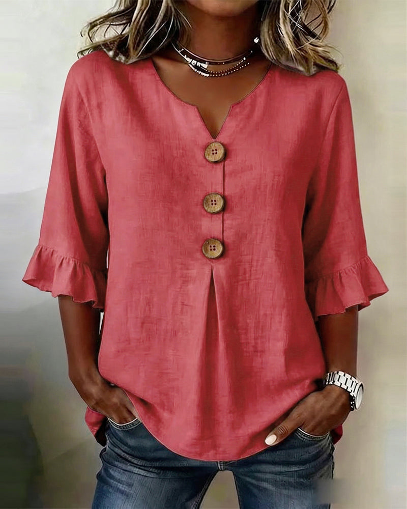 Sophie | Blusa bottonata con volant