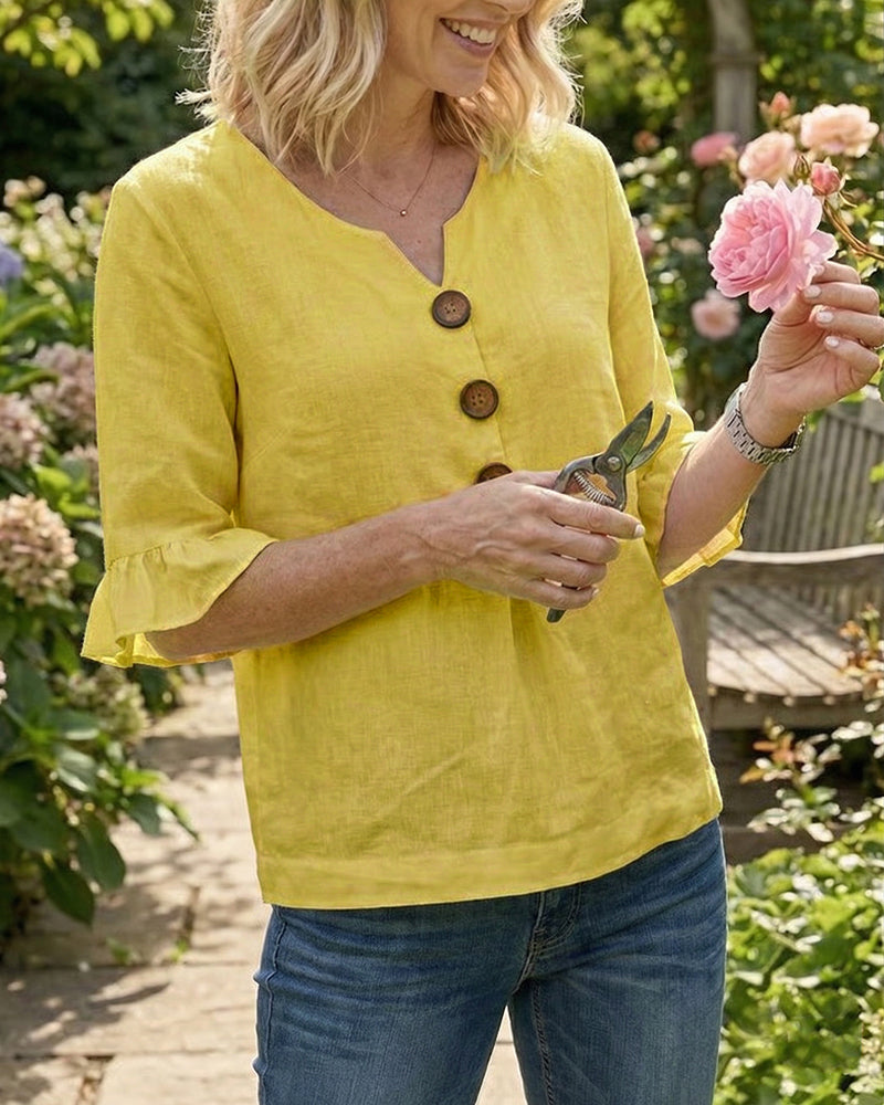 Sophie | Blusa bottonata con volant