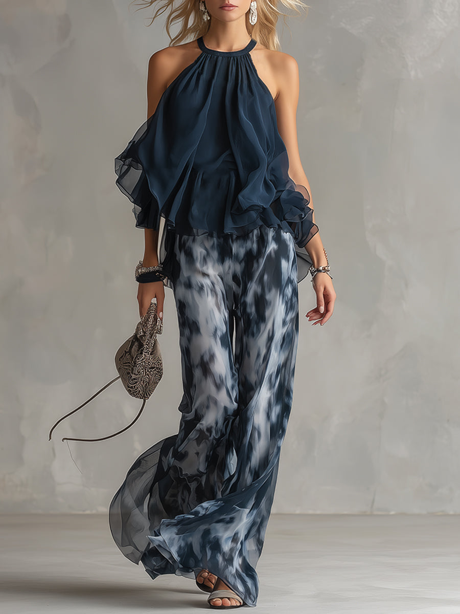 Chloé | Completo elegante con top blu navy e pantaloni larghi stampati