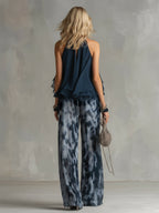 Chloé | Completo elegante con top blu navy e pantaloni larghi stampati