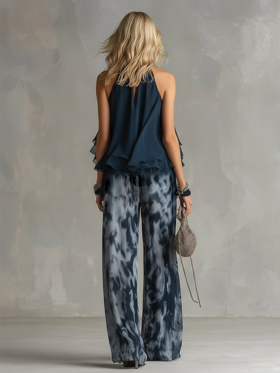 Chloé | Completo elegante con top blu navy e pantaloni larghi stampati