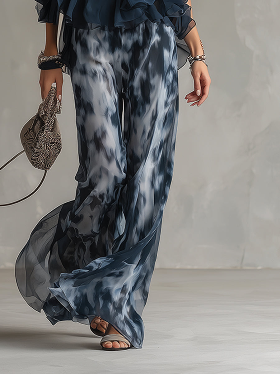 Chloé | Completo elegante con top blu navy e pantaloni larghi stampati